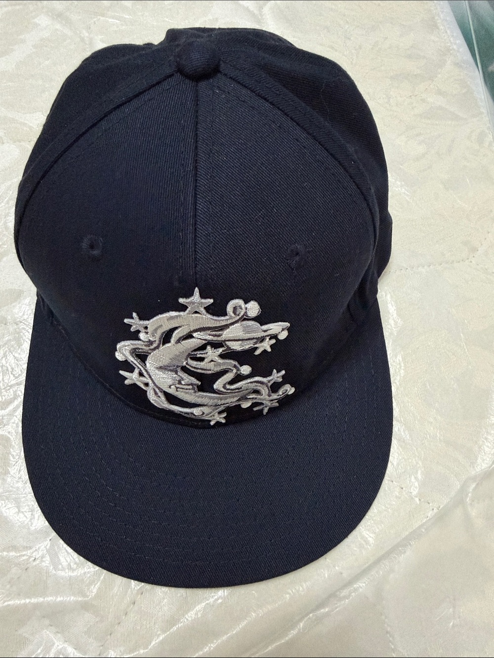 Navy Snapback Hat with Silver Dragon Crest
